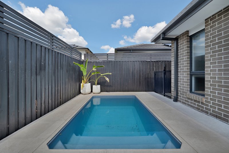 Photo - 4 Tamarind Crescent, Park Ridge QLD 4125 - Image 2