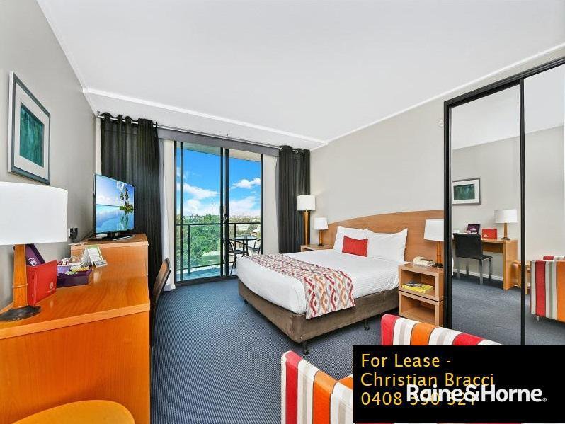 Photo - 405/110-114 James Ruse Drive, Rosehill NSW 2142 - Image 1