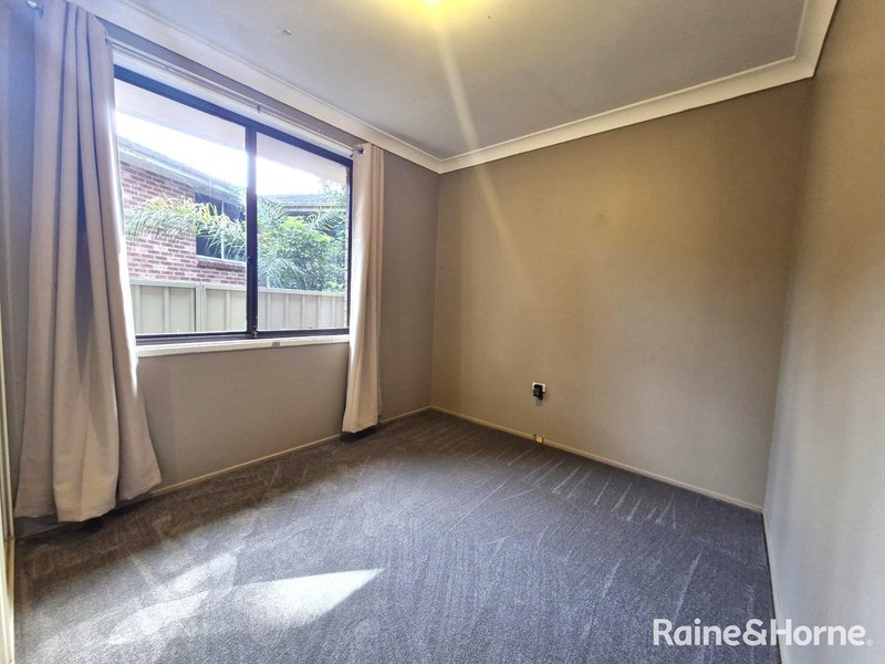 Photo - 48 Gentian Avenue, Macquarie Fields NSW 2564 - Image 9