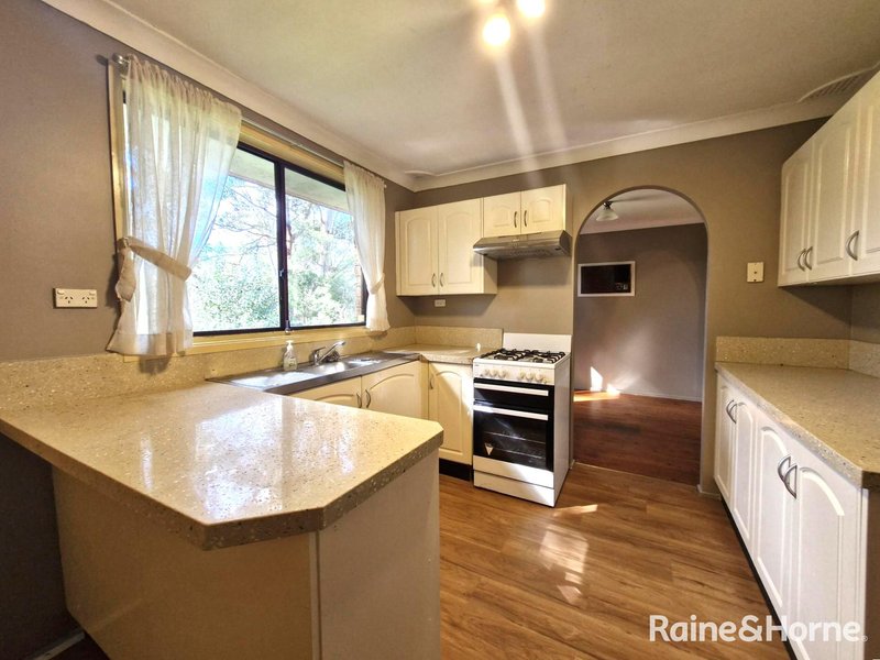 Photo - 48 Gentian Avenue, Macquarie Fields NSW 2564 - Image 10