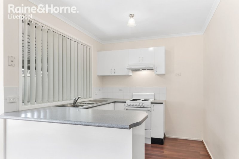 Photo - 49 Tamworth Crescent, Hoxton Park NSW 2171 - Image 7