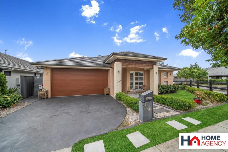 Photo - 52 Plumegrass Avenue, Denham Court NSW 2565 - Image 1