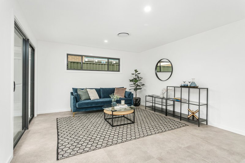 Photo - 54 Wildflower Crescent, Calderwood NSW 2527 - Image 4