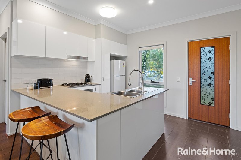 Photo - 56 Atlantic Boulevard, Glenfield NSW 2167 - Image 8