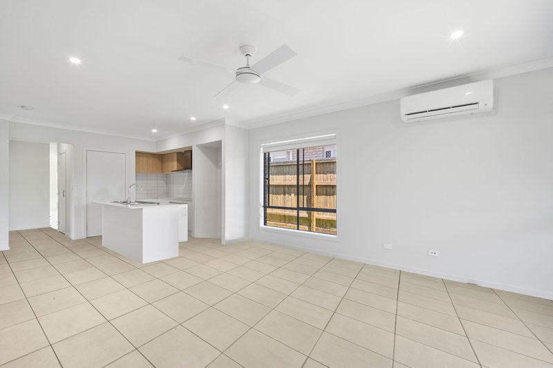 Photo - 56 Hewing Place, Park Ridge QLD 4125 - Image 2