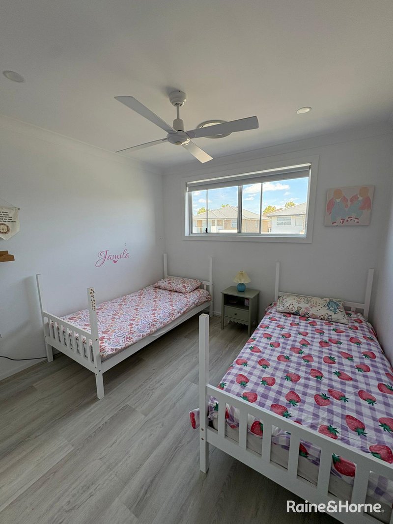 Photo - 56 Mellish Parade, Glenfield NSW 2167 - Image 11