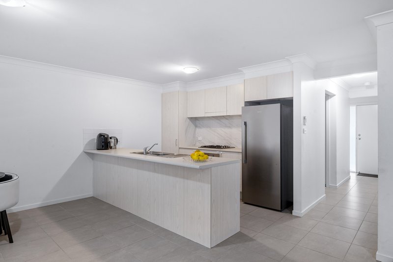 Photo - 58 Ingleburn Gardens Drive, Bardia NSW 2565 - Image 2