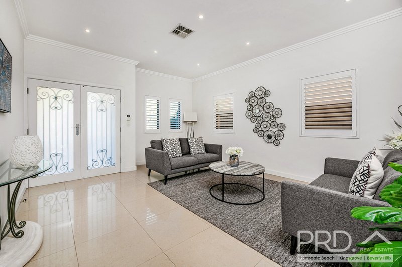 Photo - 58 New England Drive, Kingsgrove NSW 2208 - Image 2