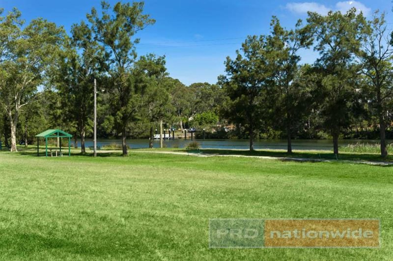 Photo - 582 Henry Lawson Drive, East Hills NSW 2213 - Image 6