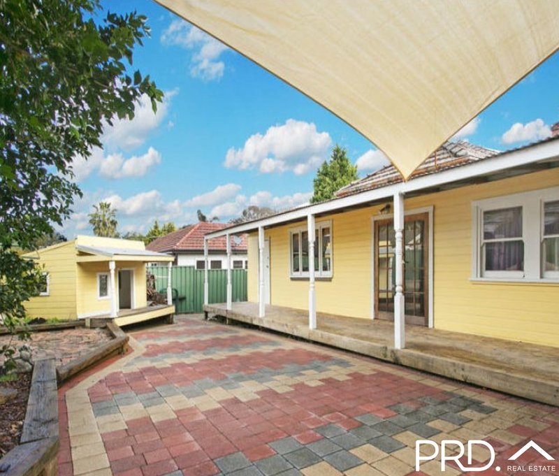 Photo - 615 Henry Lawson Drive, East Hills NSW 2213 - Image 6