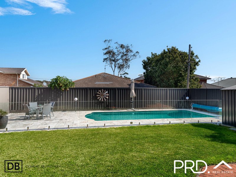 Photo - 682 Henry Lawson Drive, East Hills NSW 2213 - Image 9