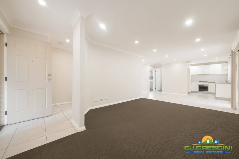 Photo - 70 Victoria Road, Macquarie Fields NSW 2564 - Image 2