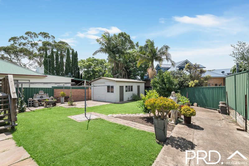 Photo - 701 Henry Lawson Drive, East Hills NSW 2213 - Image 9