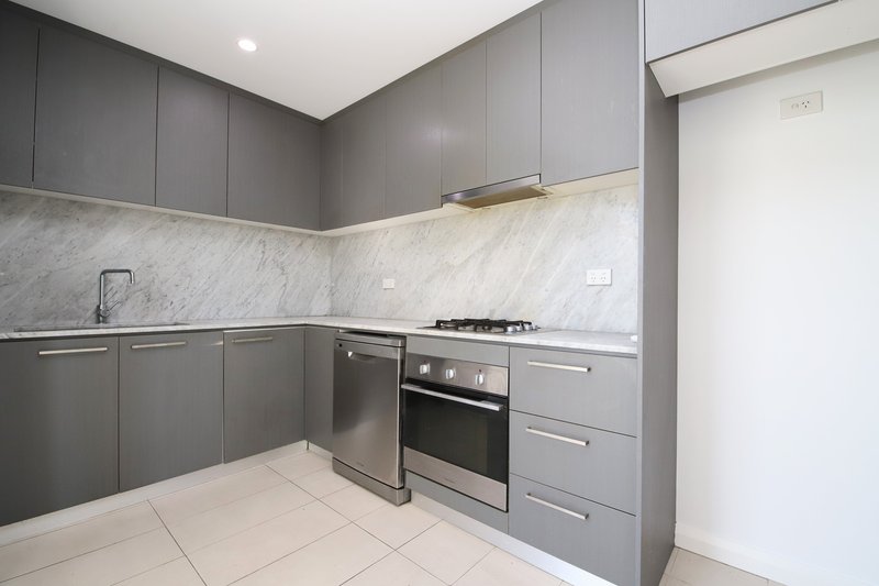 Photo - 703/61-63 Rickard Road, Bankstown NSW 2200 - Image 1