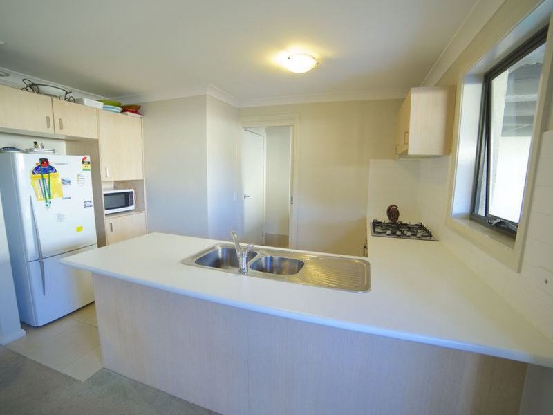 Photo - 73 Northampton Drive, Glenfield NSW 2167 - Image 4