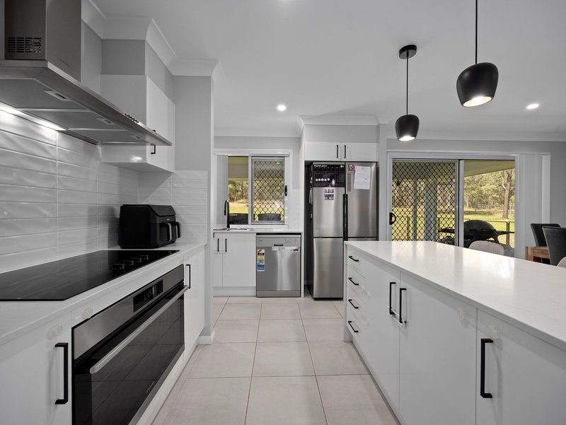 Photo - 73 Poinciana Avenue, Rifle Range QLD 4311 - Image 4