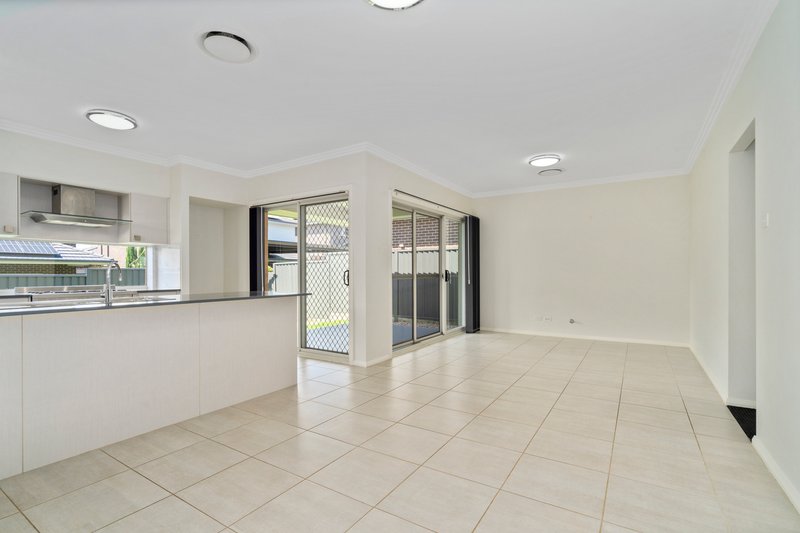 Photo - 75 Commissioners Drive, Denham Court NSW 2565 - Image 4