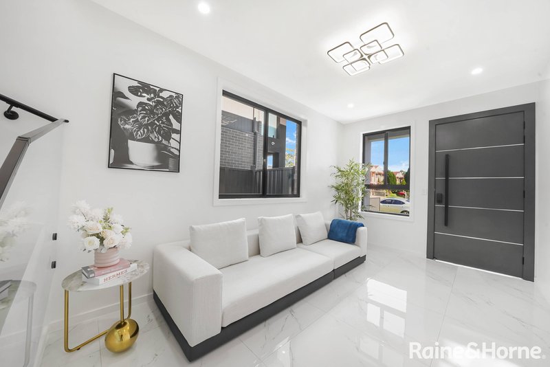 Photo - 77 Northampton Drive, Glenfield NSW 2167 - Image 2