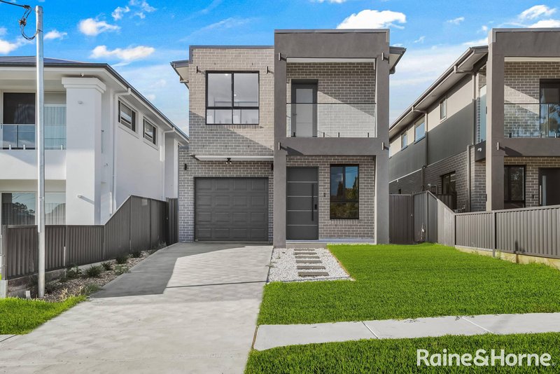 Photo - 77 Northampton Drive, Glenfield NSW 2167 - Image 12