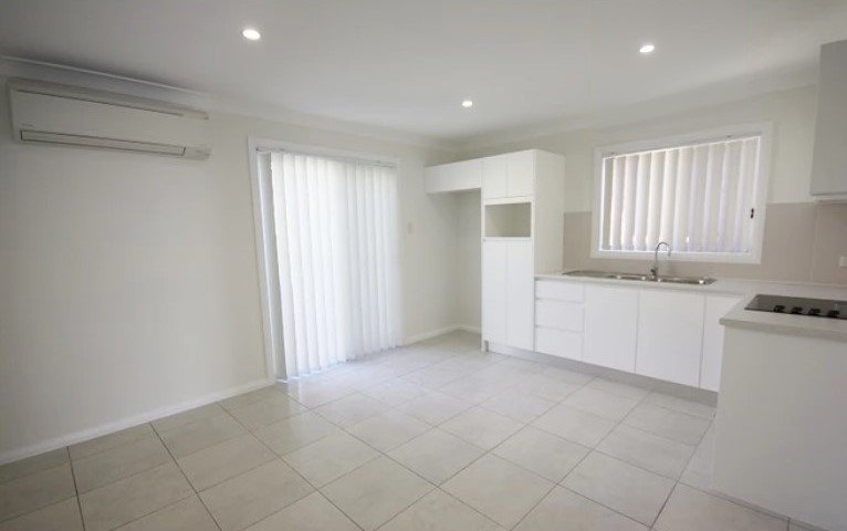 Photo - 7A Buttercup Street, Macquarie Fields NSW 2564 - Image 1