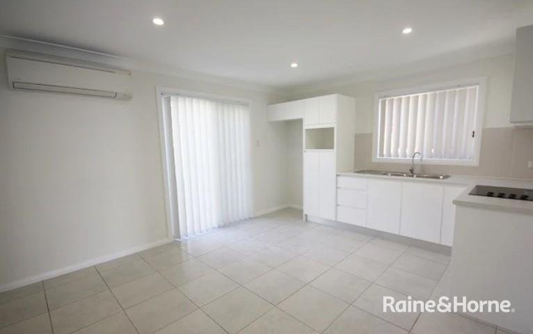 Photo - 7A Buttercup Street, Macquarie Fields NSW 2564 - Image 2