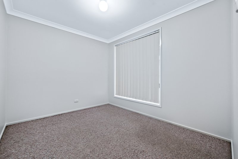 Photo - 8/63 Fuchsia Crescent, Macquarie Fields NSW 2564 - Image 7