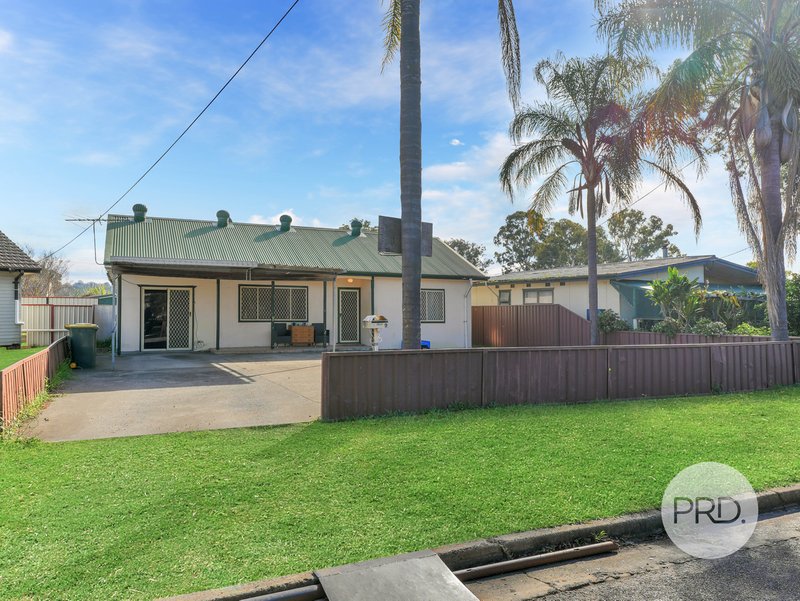 Photo - 9 Annette Avenue, Ingleburn NSW 2565 - Image 1