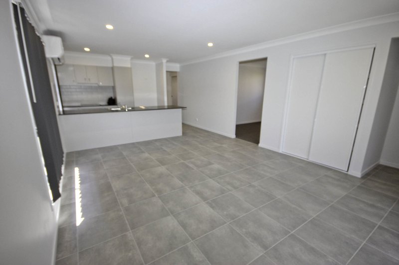 Photo - 9 Bark Street, Park Ridge QLD 4125 - Image 3