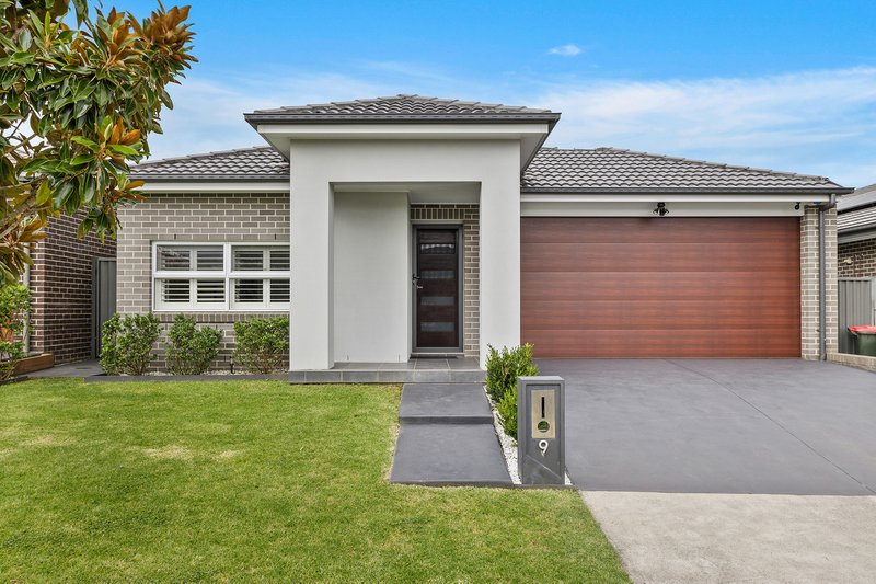 Photo - 9 Honeybee Crescent, Calderwood NSW 2527 - Image 1
