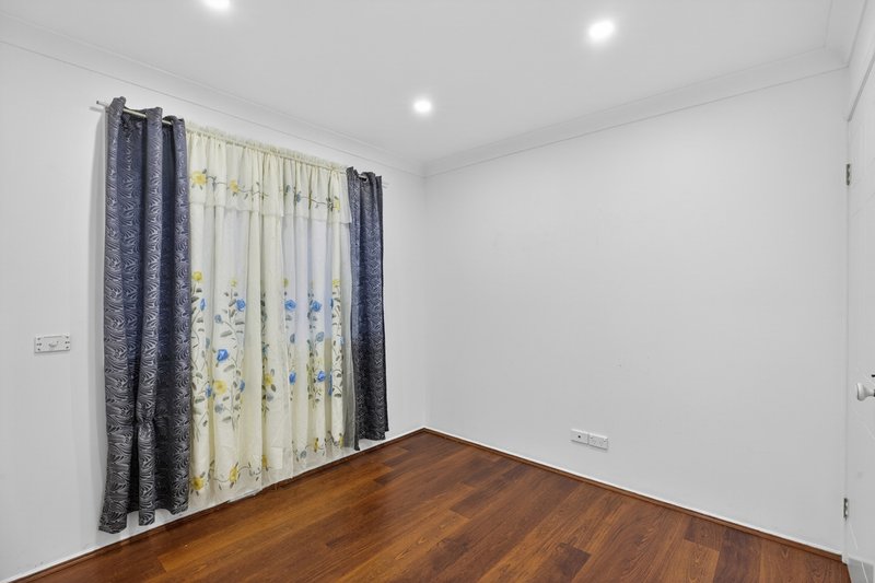 Photo - 9 Vanessa Place, Macquarie Fields NSW 2564 - Image 9