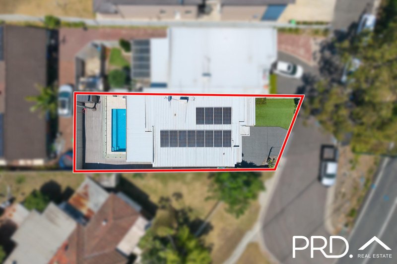 Photo - 911 Henry Lawson Drive, Picnic Point NSW 2213 - Image 2