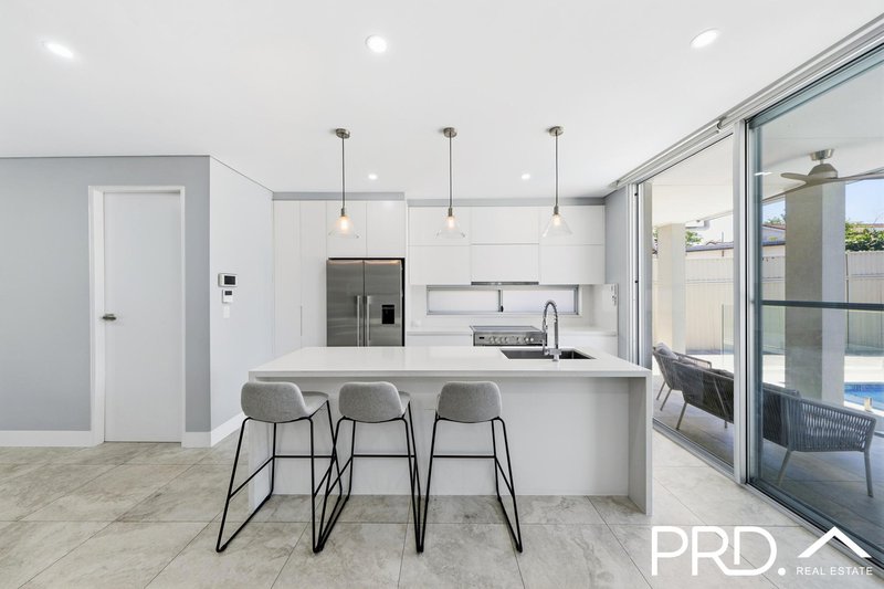 Photo - 911 Henry Lawson Drive, Picnic Point NSW 2213 - Image 4