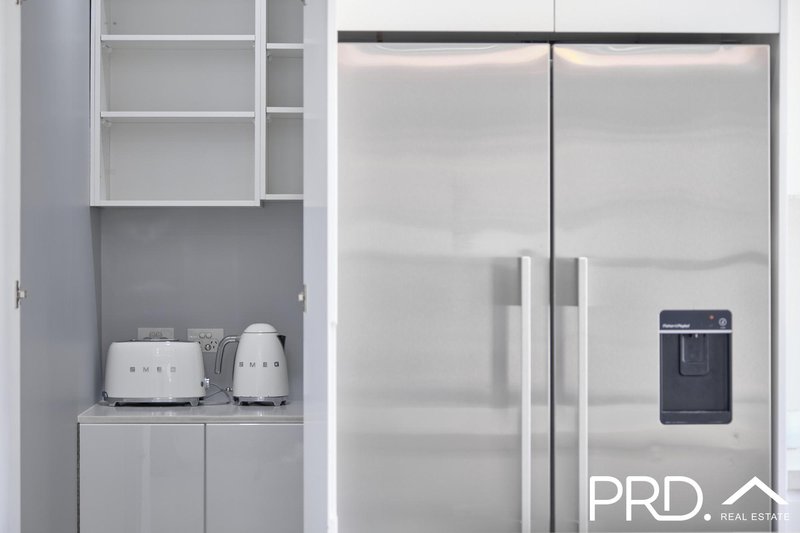 Photo - 911 Henry Lawson Drive, Picnic Point NSW 2213 - Image 5