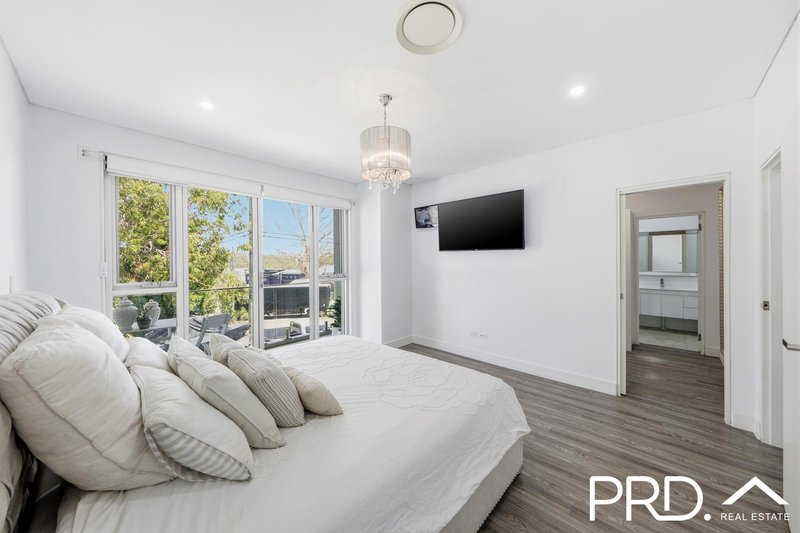 Photo - 911 Henry Lawson Drive, Picnic Point NSW 2213 - Image 10