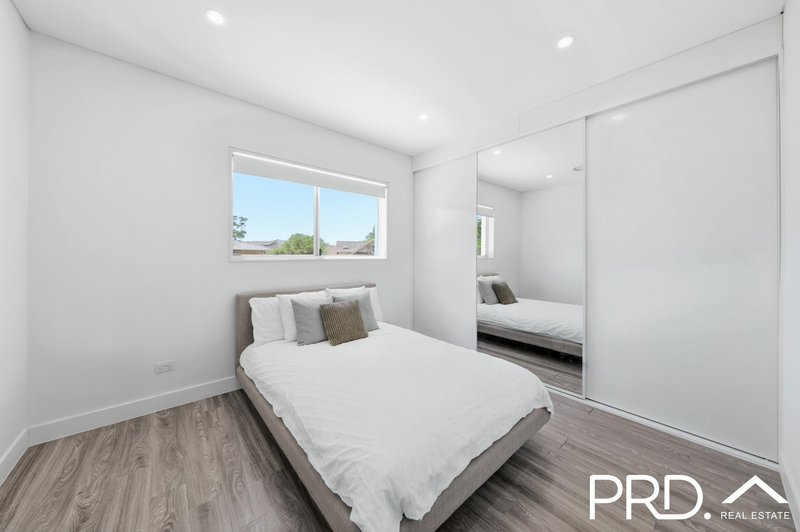 Photo - 911 Henry Lawson Drive, Picnic Point NSW 2213 - Image 12