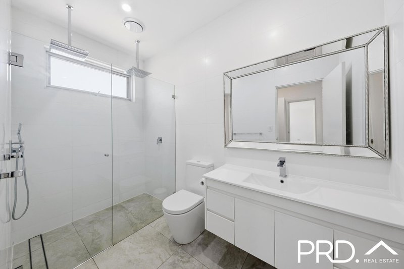 Photo - 911 Henry Lawson Drive, Picnic Point NSW 2213 - Image 13