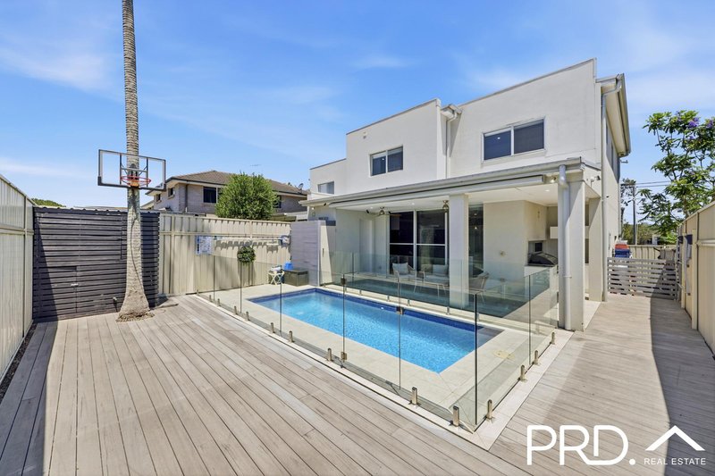 Photo - 911 Henry Lawson Drive, Picnic Point NSW 2213 - Image 17