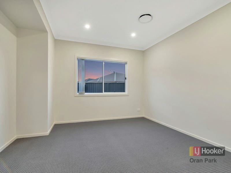 Photo - 95 Sawsedge Avenue, Denham Court NSW 2565 - Image 6