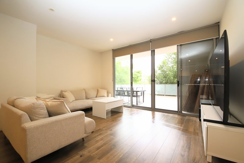 Photo - A102/2 Rowe Drive, Potts Hill NSW 2143 - Image 1