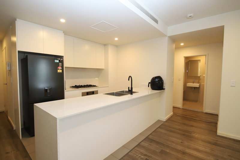 Photo - A102/2 Rowe Drive, Potts Hill NSW 2143 - Image 2